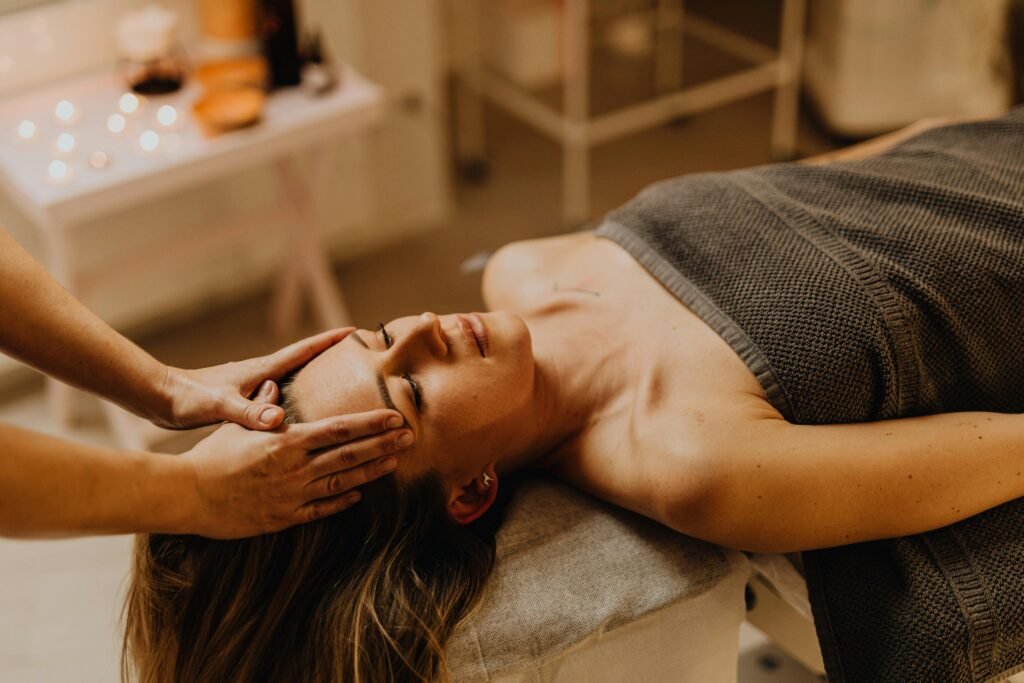 pexels-photo-6629549-6629549 A serene head massage session at a spa, enhancing relaxation and wellness.